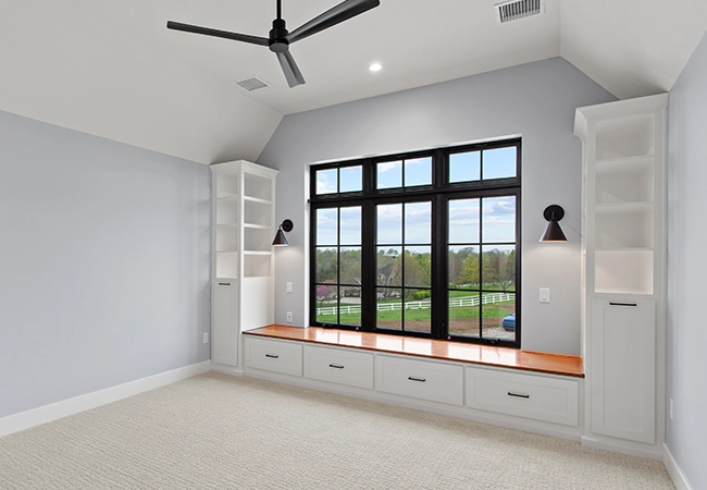 Custom shelving installed in a living room in Dilworth, Charlotte